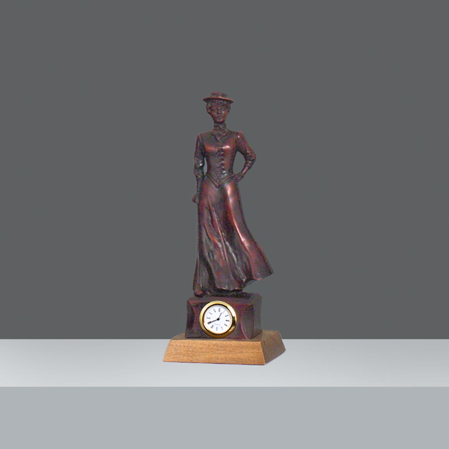 ESTATUILLA MUJER RELOJ h.28cm